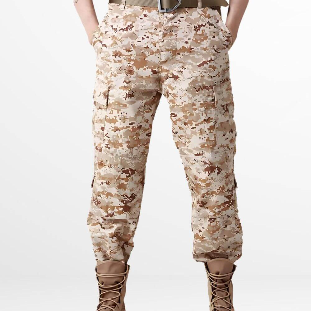 Tactical desert camo cargo pants displayed on a person with tan boots, featuring a pixelated design for effective camouflage in desert environments.