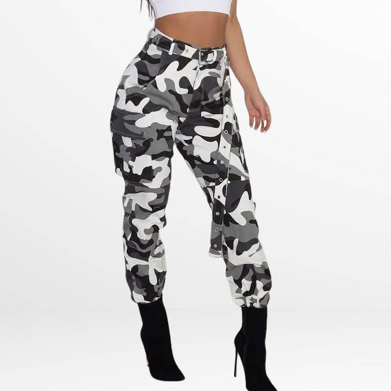 Camo Cargo Pants High-Waisted in a black and white camo design viewed from the side, showcasing a unique monochrome print, combined with a black top and lace-up heeled boots.