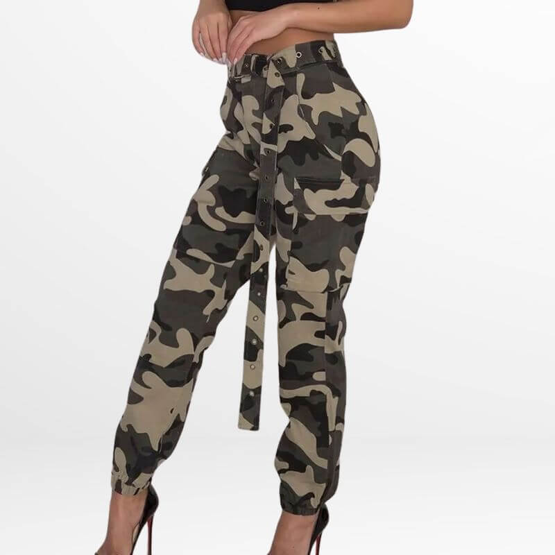 Side view of Camo Cargo Pants High-Waisted in a khaki color, displayed by a model posing with cinched ankle details and stylish side buttons, paired with black heels.