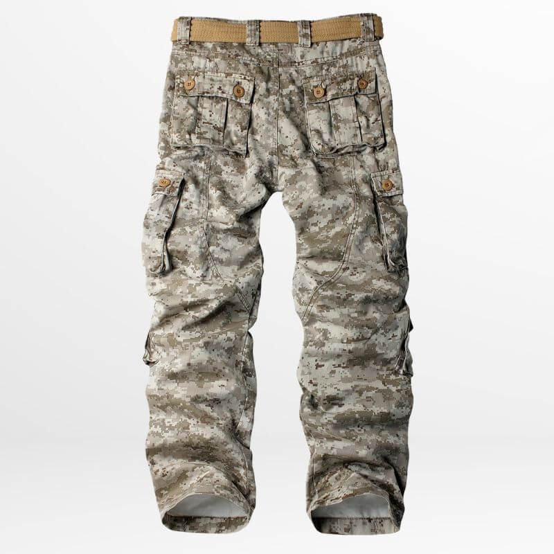 Rear view of military desert camouflage pants, complete with a woven khaki belt and spacious pockets, on a plain white backdrop.