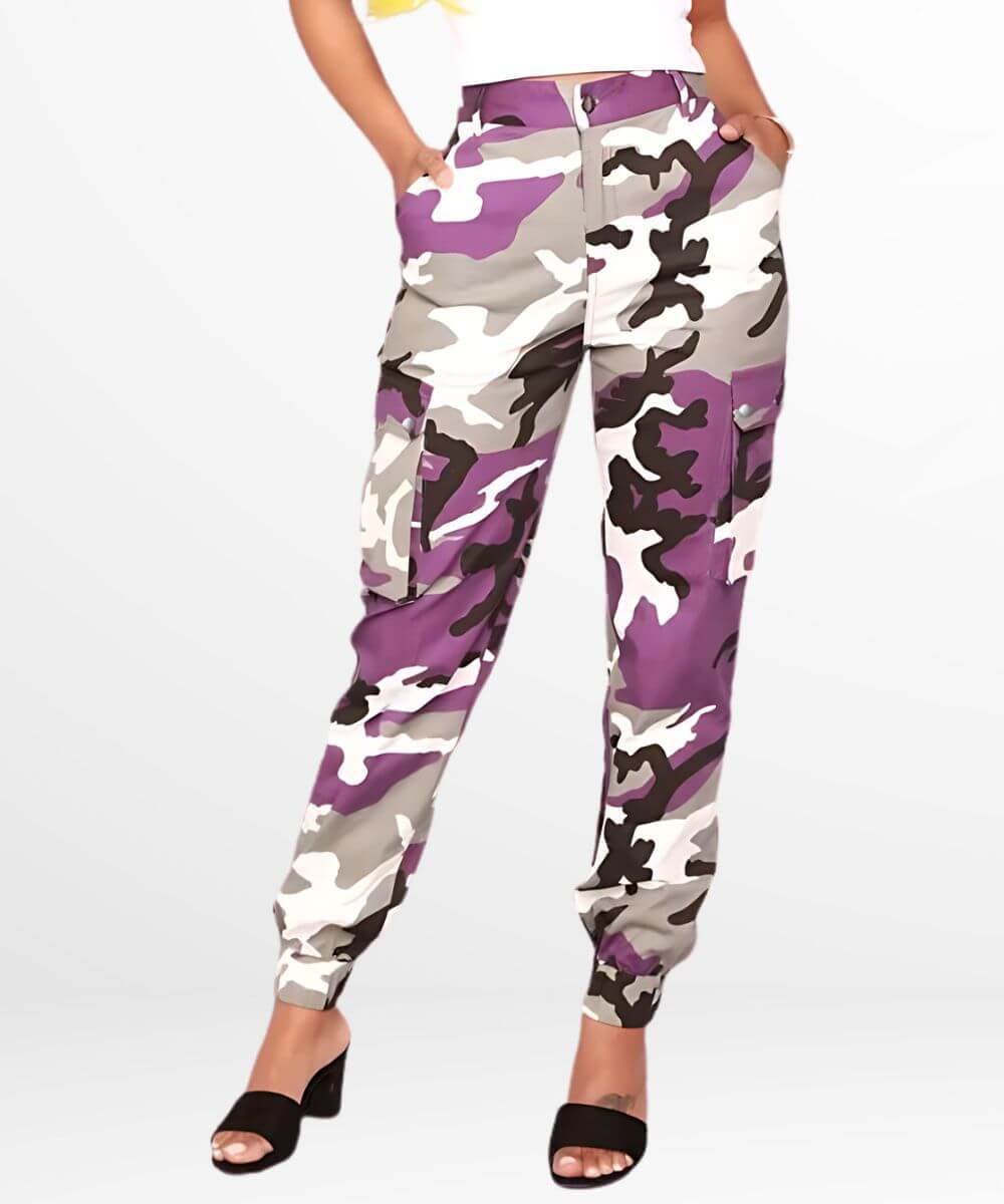 Woman wearing fitted purple camo cargo pants with multiple utility pockets.