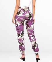 Stylish purple camouflage cargo pants for women with cuffed ankles and a relaxed fit.