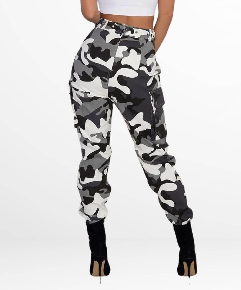 Back view of women's black and white camo cargo pants, highlighting the rear pocket design.