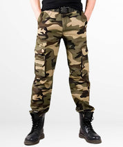 Full-length view of a person wearing army camouflage cargo pants and black combat boots, standing against a white background.