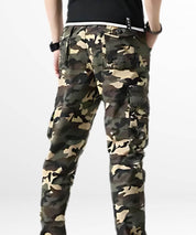 Back view of a man wearing skinny camo cargo pants, highlighting rear pocket design.