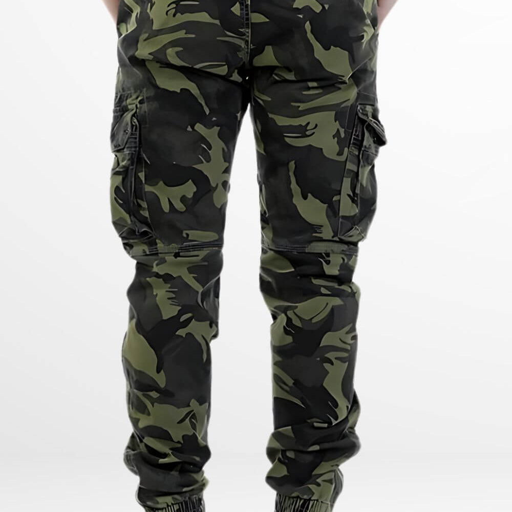 Back view of Black and Green Camo Pants with cuffed ankles, paired with white sneakers.