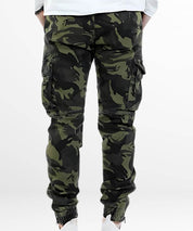 Back view of Black and Green Camo Pants with cuffed ankles, paired with white sneakers.