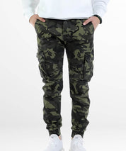 Front view of Black and Green Camo Pants with a modern fit, styled with white sneakers.