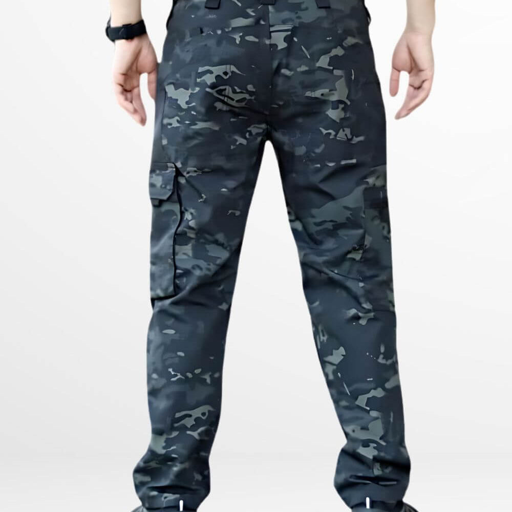 Back view of black camouflage military pants detailing the secure pockets and relaxed fit.