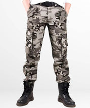 Front view of black, grey, and white camo cargo pants with a black belt and boots, against a white background.