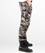 Side view of black, grey, and white camouflage cargo pants with side pockets and snug boot fit.