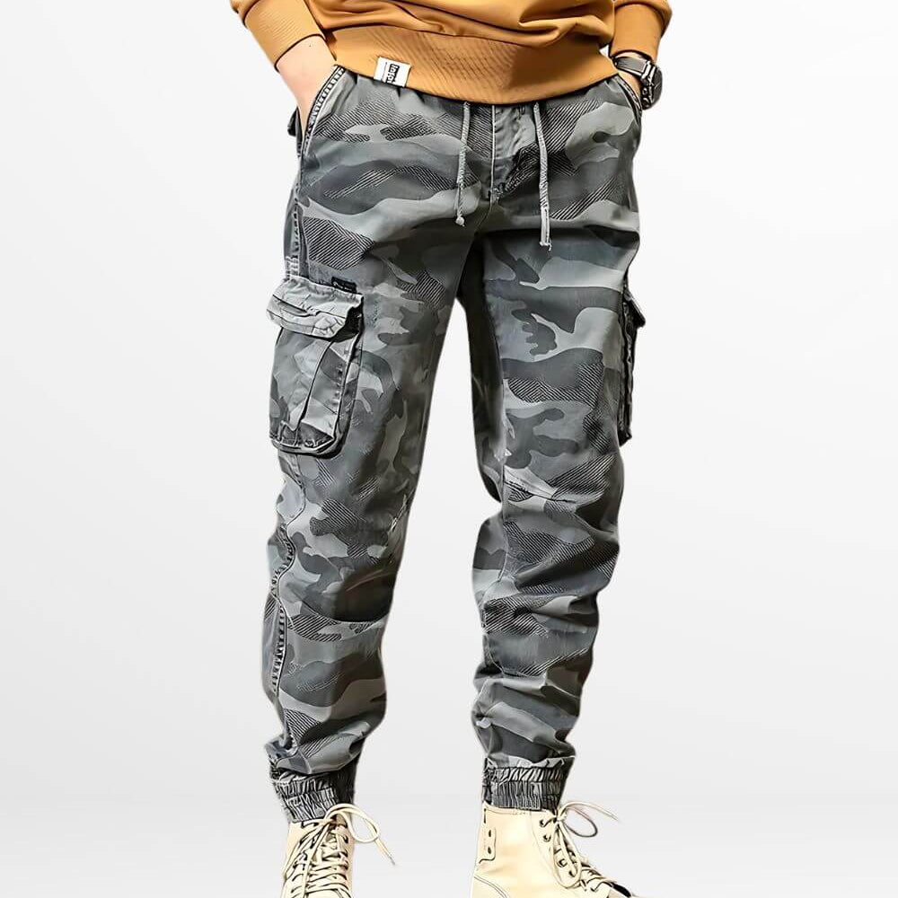 Trendy men's blue camo cargo pants with drawstring waist and side pockets.