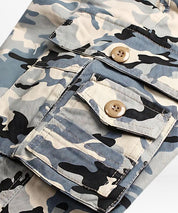 Detail of buttoned cargo pocket on Blue Camouflage Pants Mens, showing the textured fabric.
