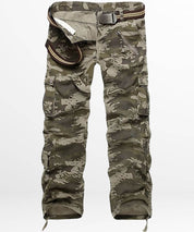A pair of brown camouflage cargo pants with integrated belt, featuring multiple pockets and a tactical design, suitable for outdoor apparel.