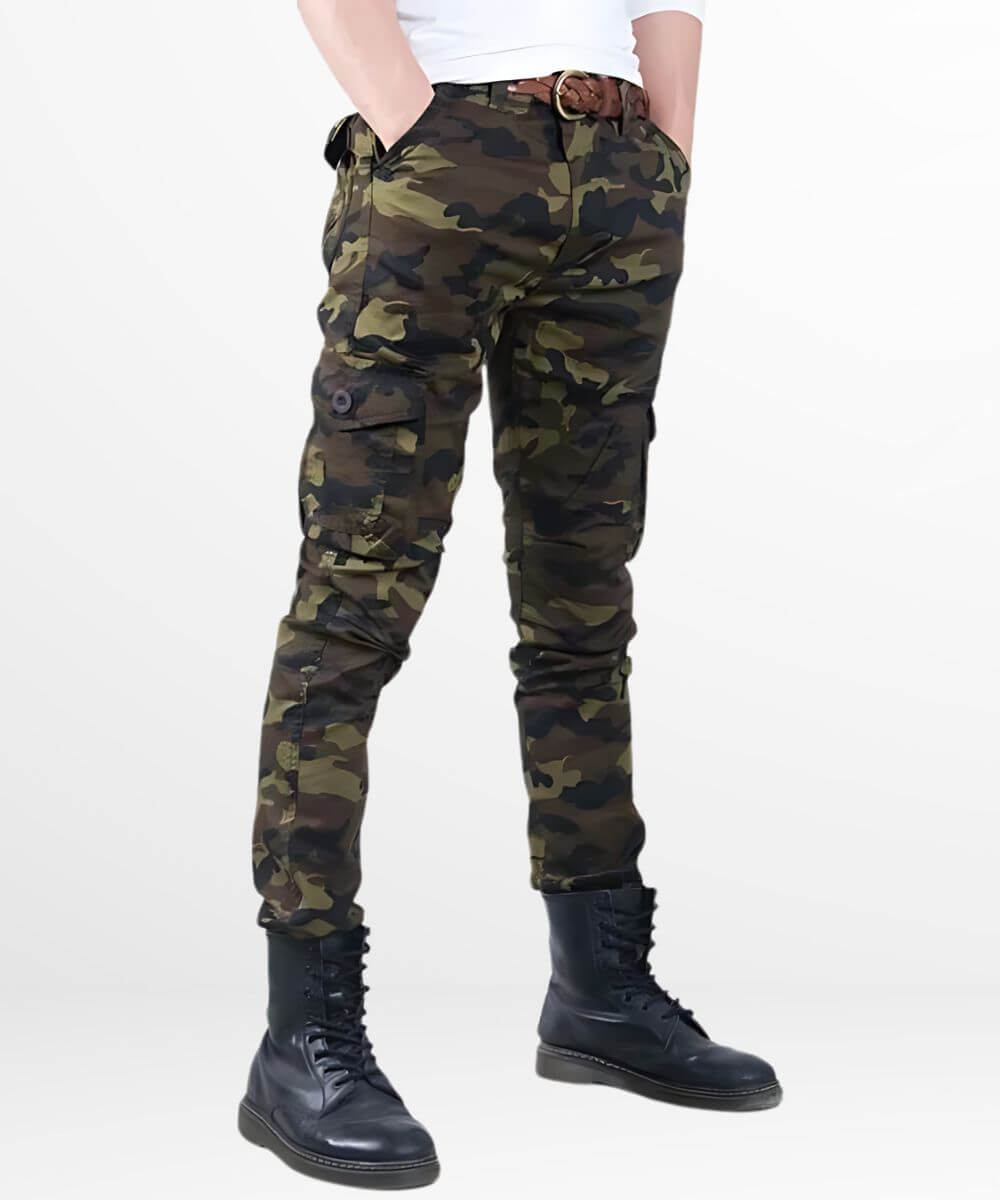 Angled view of a man wearing camo cargo pants in a slim fit cut, showcasing the side pockets and black boots.