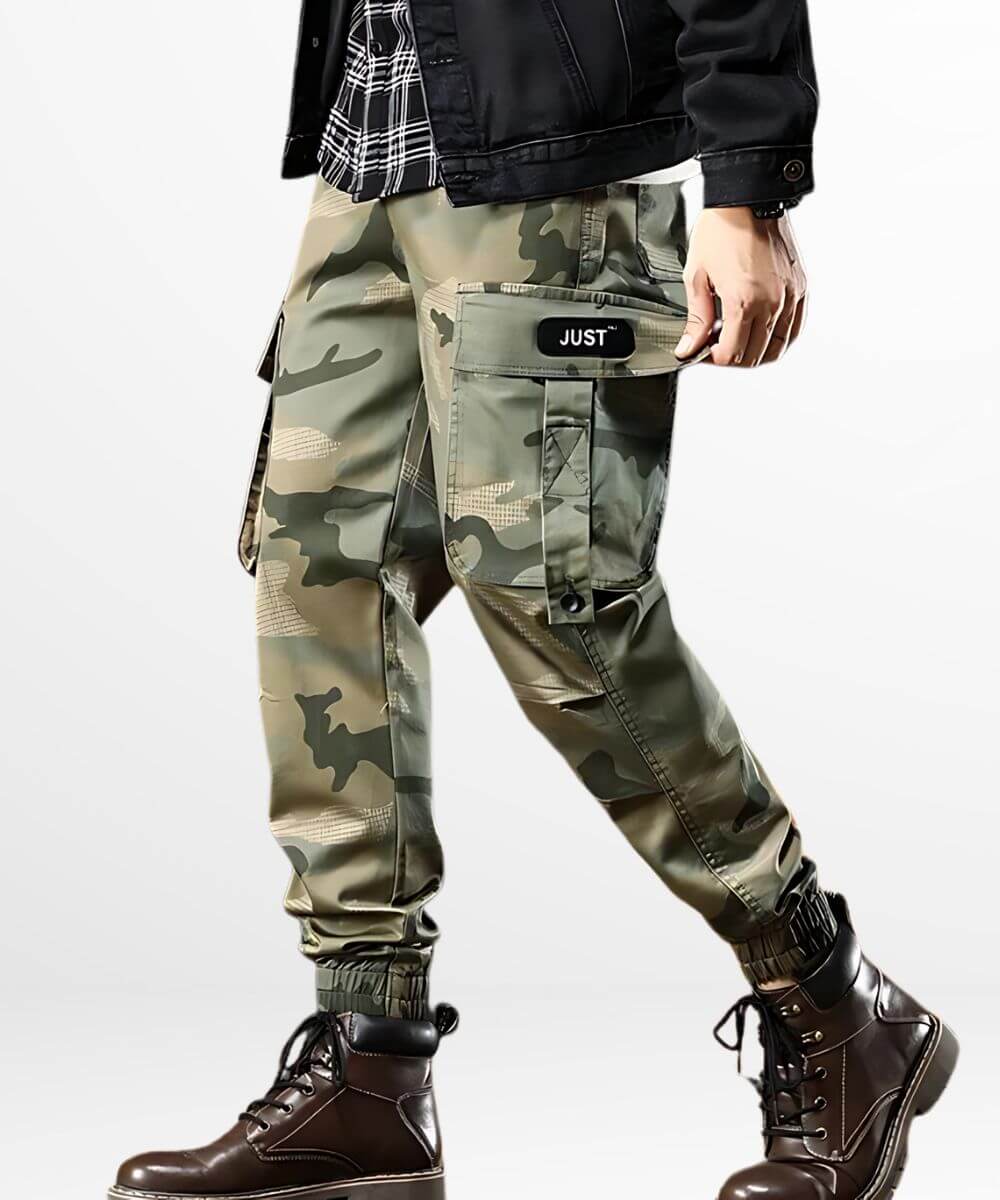 Casual walking pose featuring camo green cargo pants for men, combined with brown boots for a streetwear vibe.
