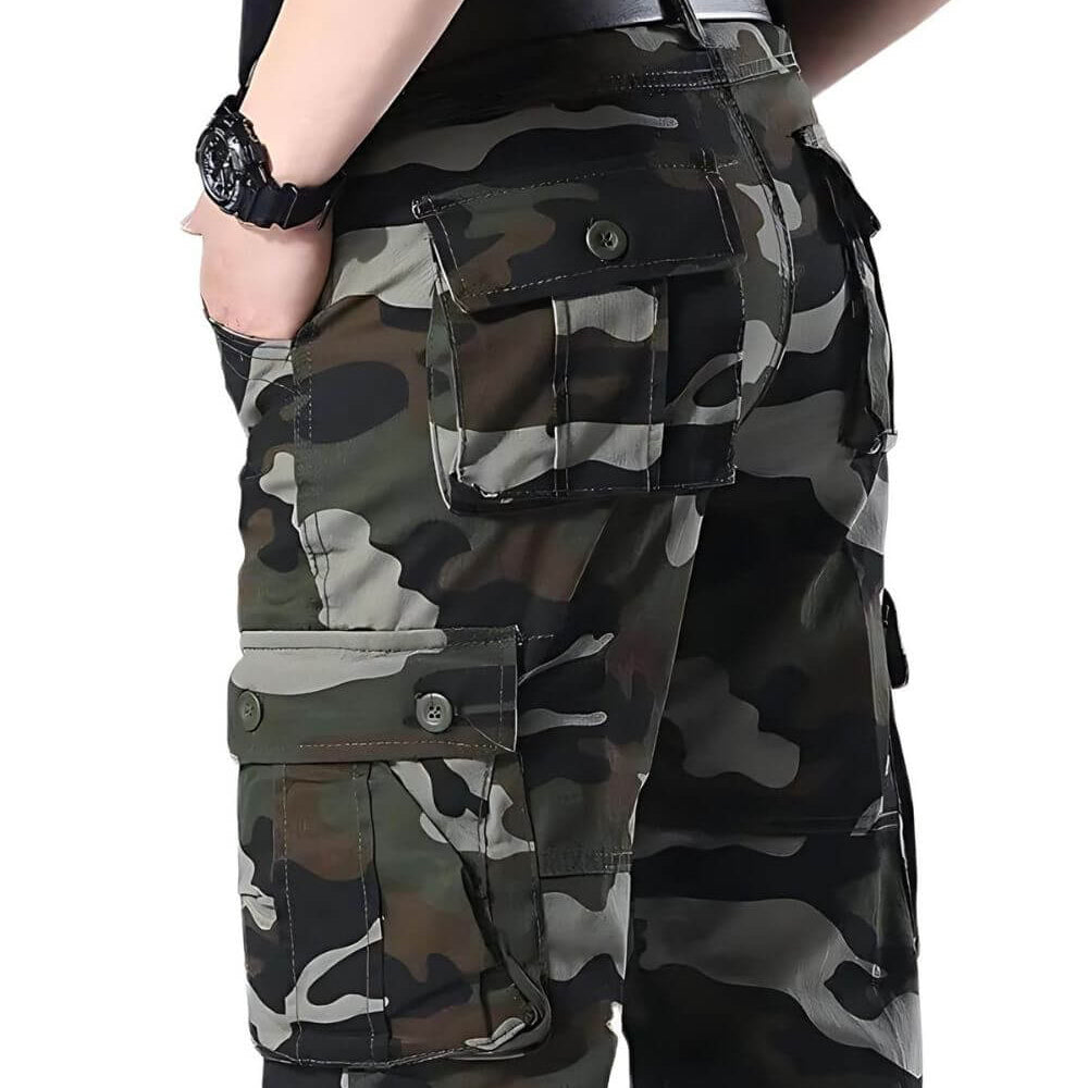 Close-up of the back pocket detail on men's camo hunting pants.