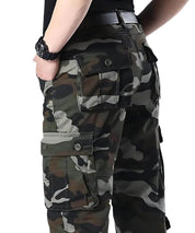 Close-up of the back pocket detail on men's camo hunting pants.