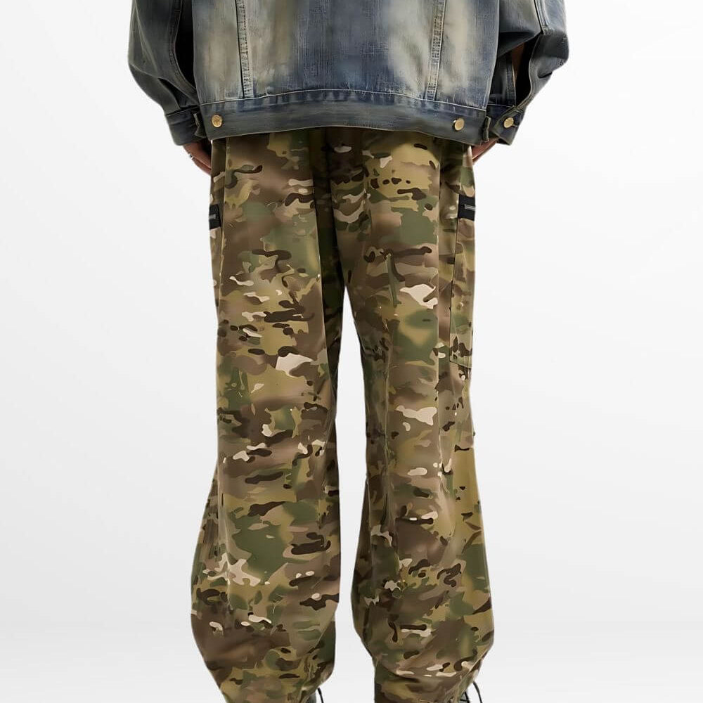 Full back view of baggy camouflage pants showing all pockets and grey boot details.