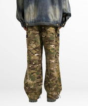 Full back view of baggy camouflage pants showing all pockets and grey boot details.