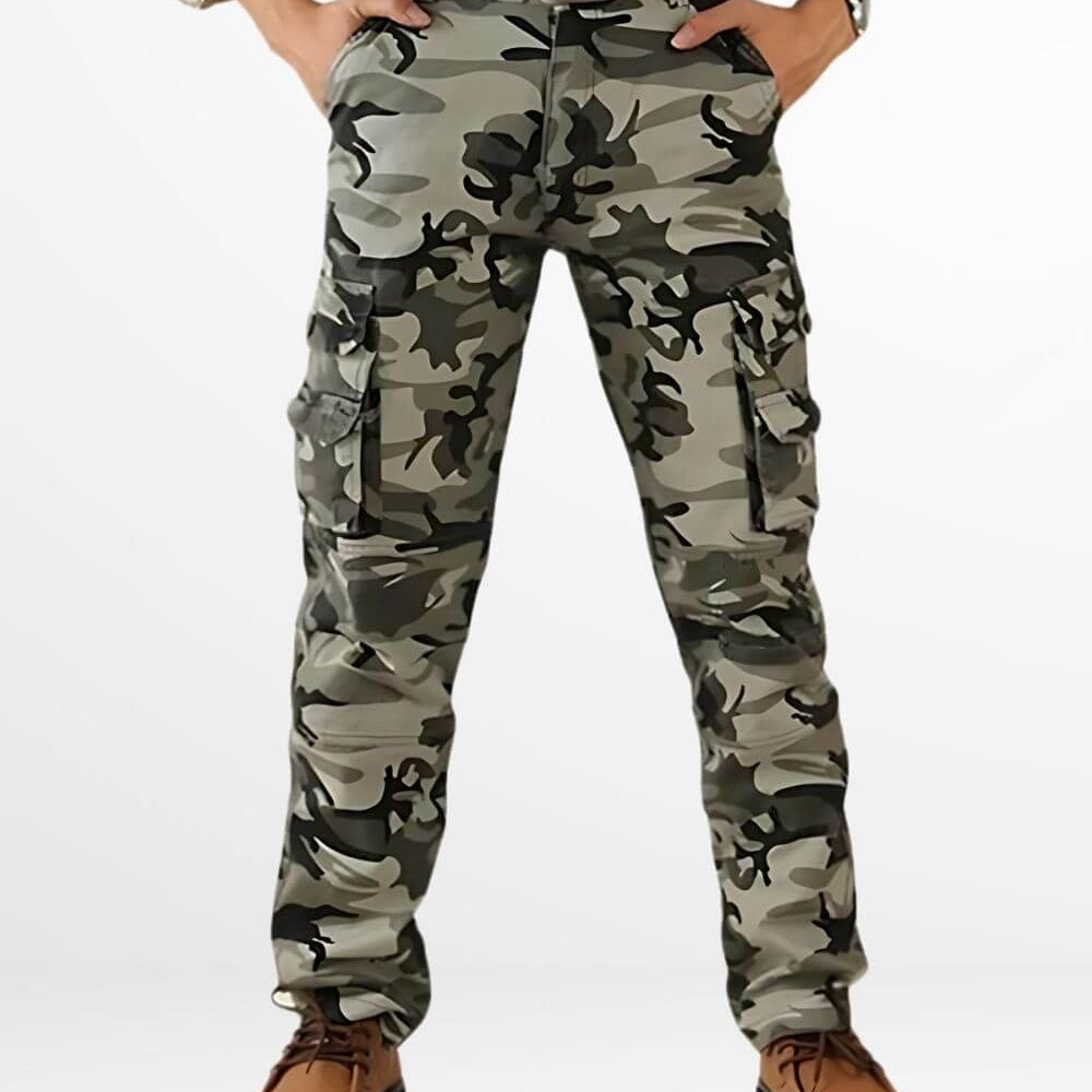 Front view of cargo pants for men in camo print, paired with brown leather shoes and a plaid shirt for a rugged outdoor look.