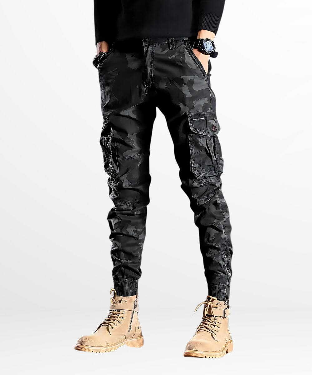 Casual slim camouflage cargo pants featuring ankle tie details and a relaxed fit, styled with trendy boots.