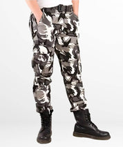Men's streetwear look featuring white and black camo cargo pants for a modern urban style.