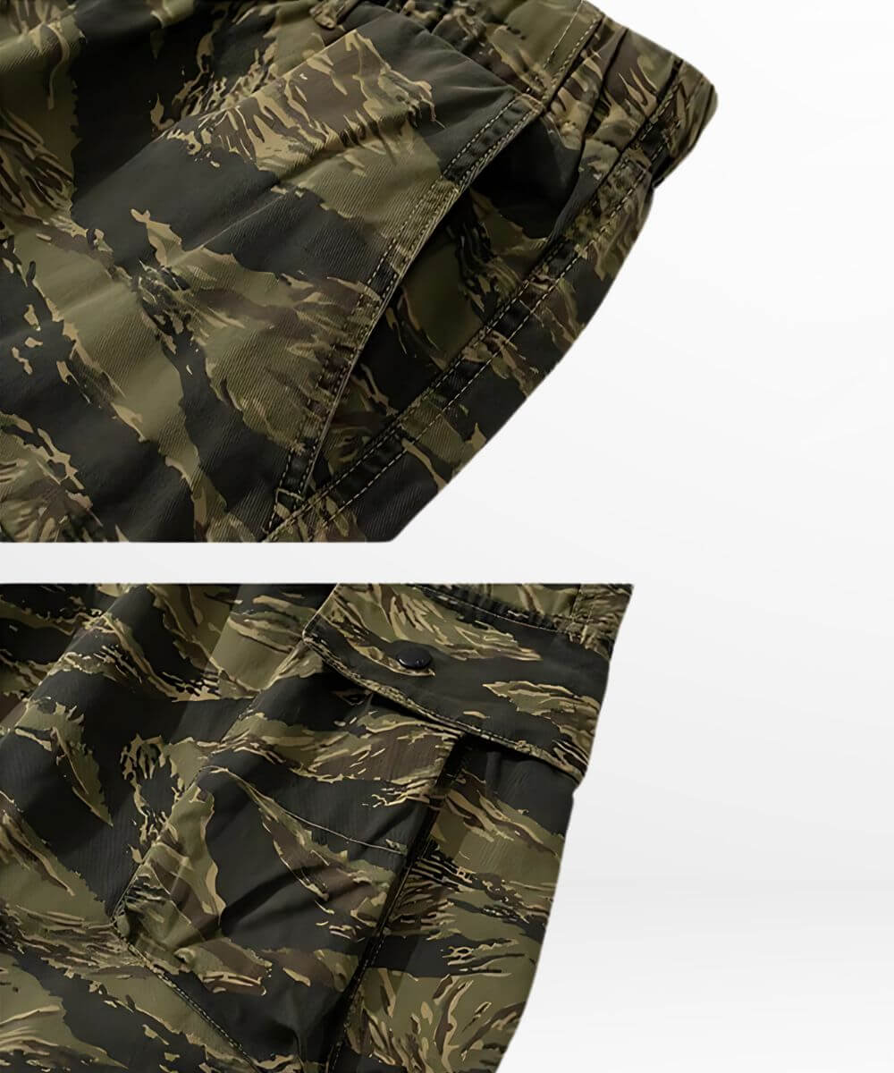 Texture close-up of baggy camouflage cargo pants showing fabric quality and pocket details.