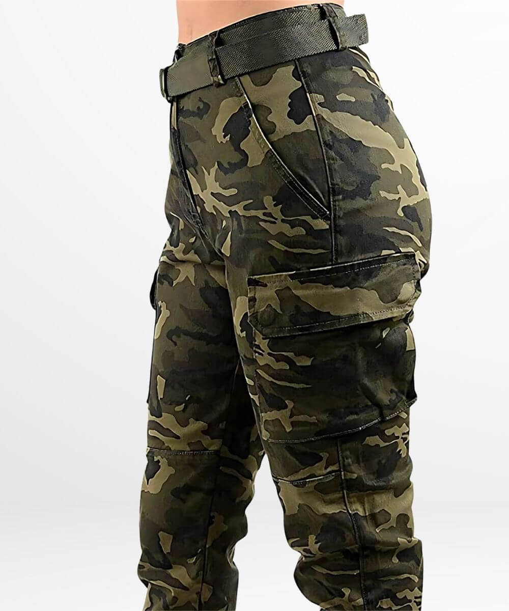 Close-up of the high-waisted fit of women's camo cargo pants, featuring detailed stitching and a built-in belt, emphasizing a fashionable utility look.