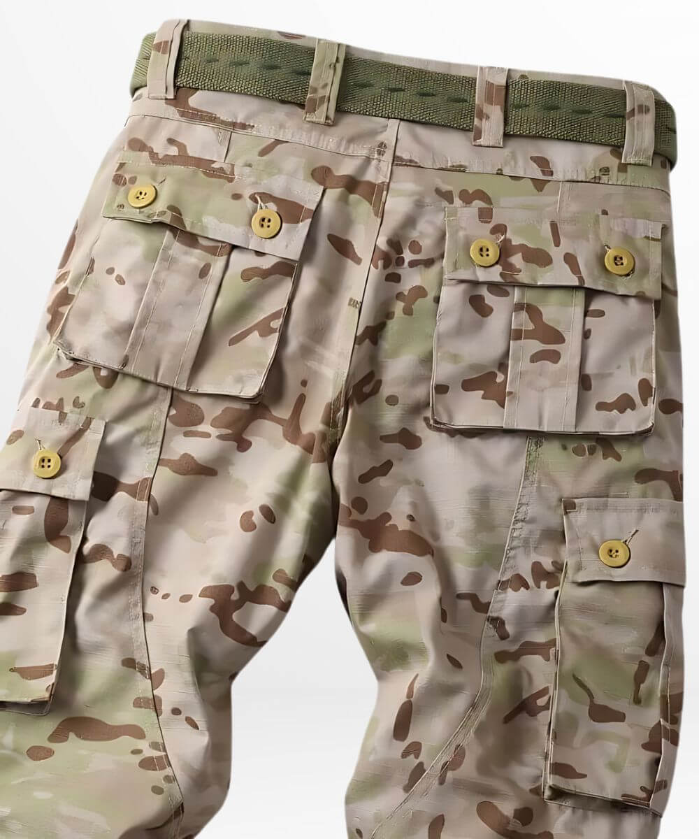 Detailed view of the belted waist of desert camo combat pants, designed for a secure fit in active scenarios.