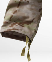Close-up of the adjustable ankle ties on desert camo pants, emphasizing adaptability and detailed craftsmanship.