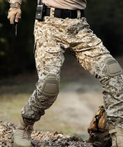 Close-up of desert camo pants for men, equipped with tactical gear and a sheathed knife, highlighting durability and outdoor functionality.