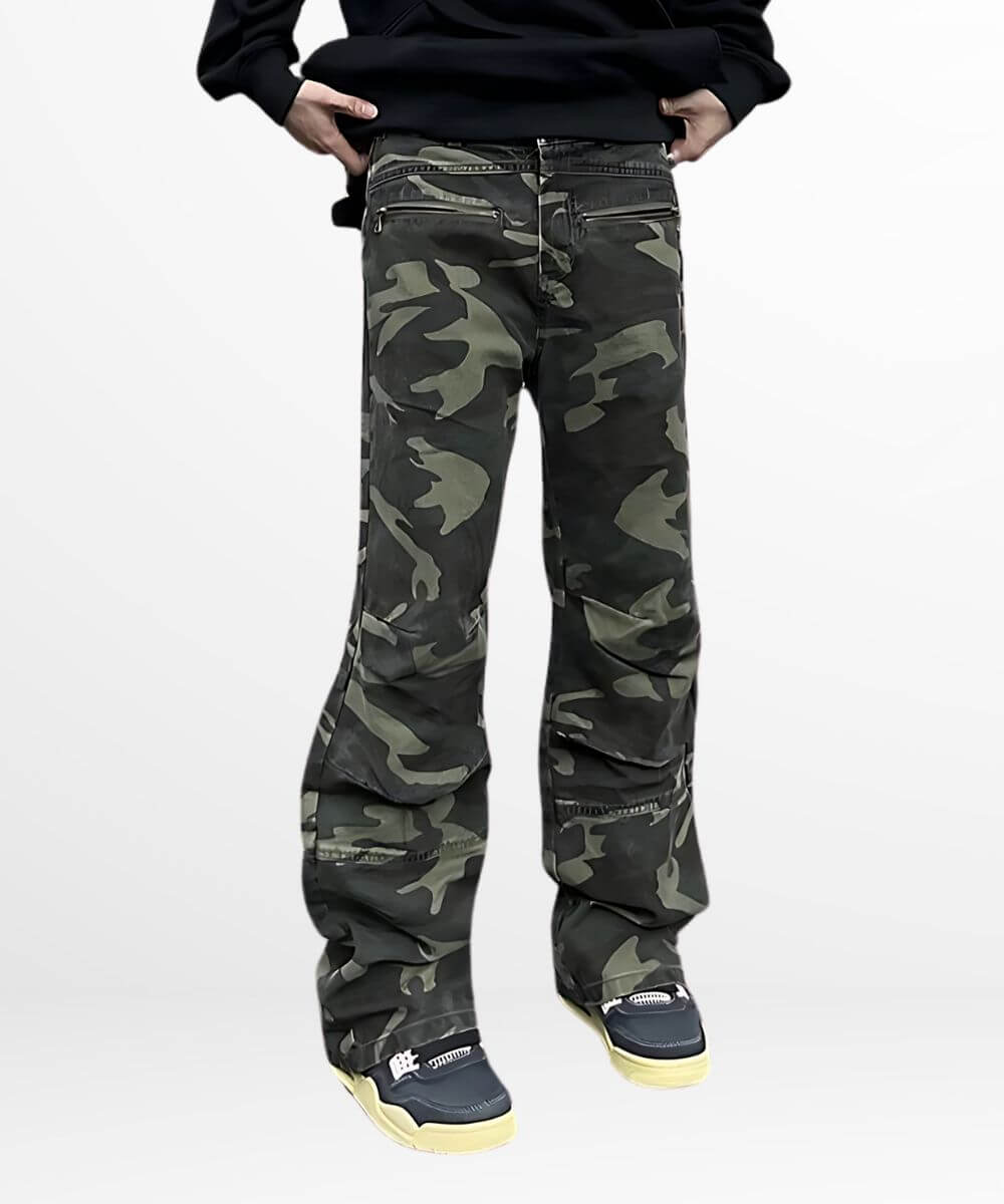 Model wearing flared camo cargo pants paired with a black sweatshirt, showcasing a casual and trendy look.
