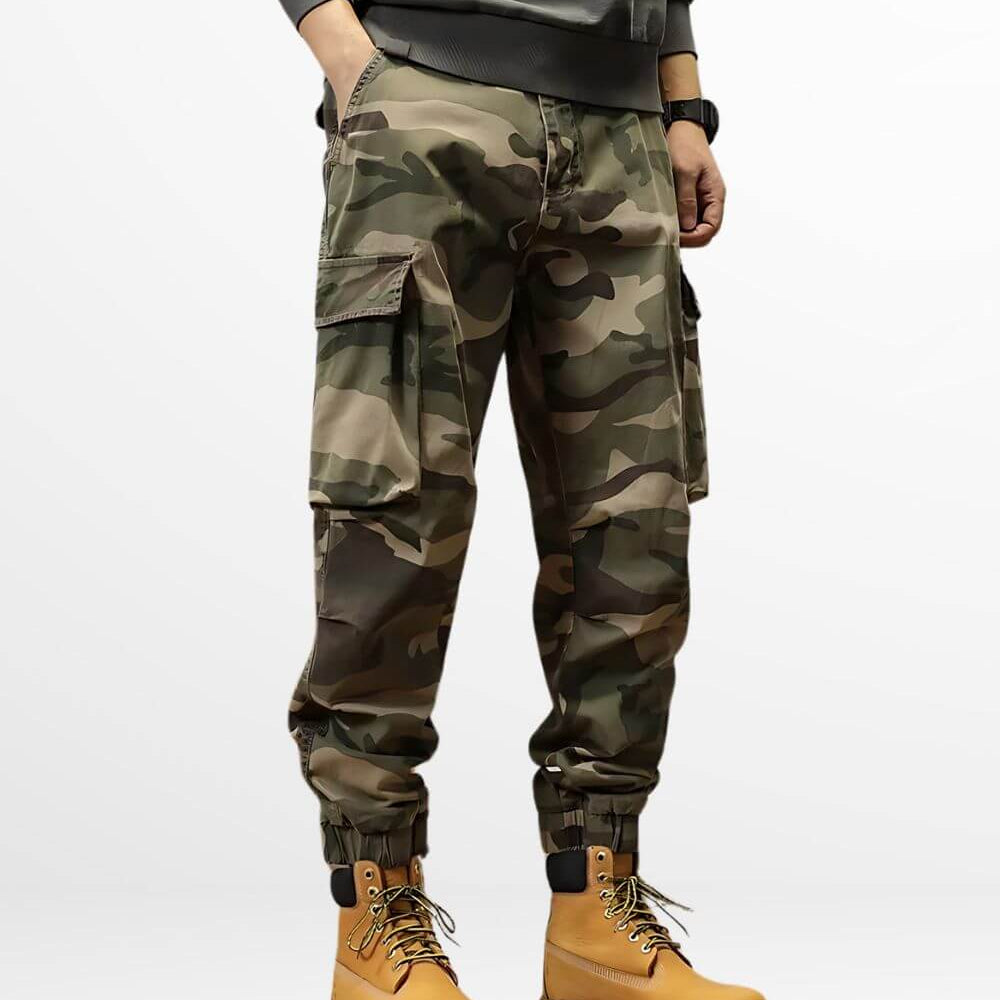 Stylish green baggy camo cargo pants paired with classic Timberland boots for a rugged look.