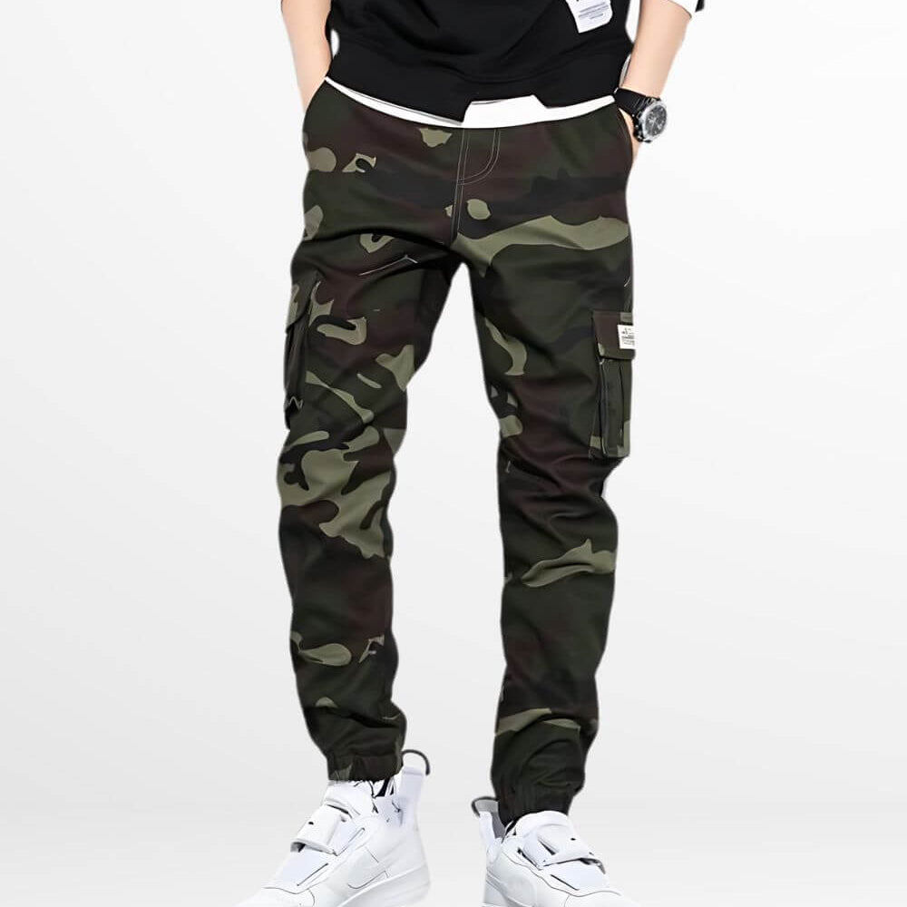 Fashion-forward green camo pants mens style paired with white high-top sneakers, ideal for a casual urban look.
