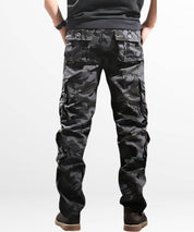 Back view of grey cargo and camo pants for men, showing detailed pockets and a snug waistband.