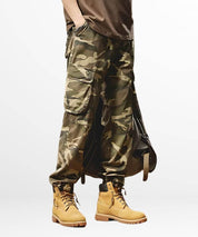 Stylish and trendy khaki camouflage cargo pants for a casual, rugged outdoor look.