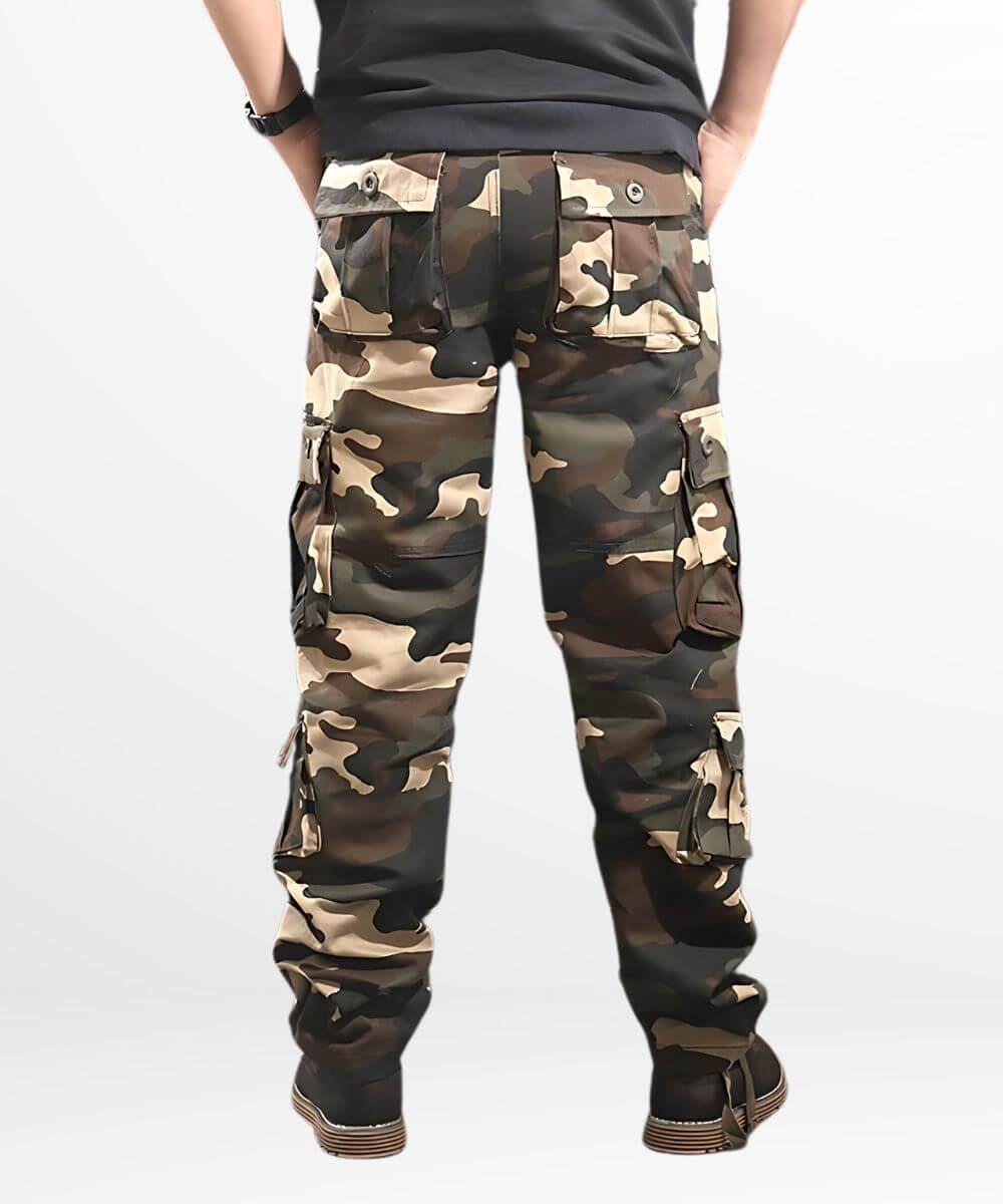 Back view of a man wearing khaki cargo and camo pants for men, focusing on the detailed pocket design.