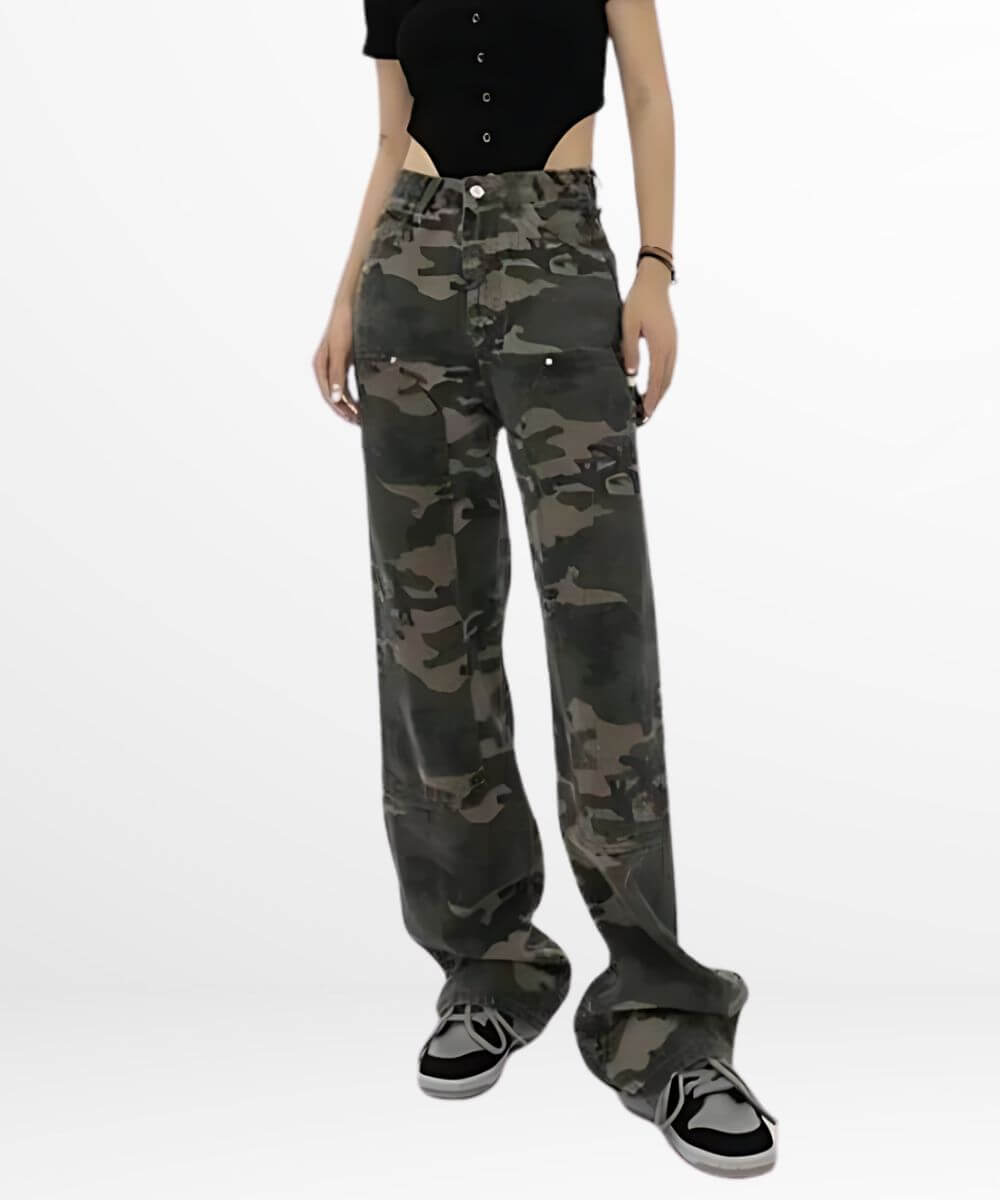 Casual style view of loose fit camo cargo pants on a woman complemented with a snug black top and sporty sneakers.