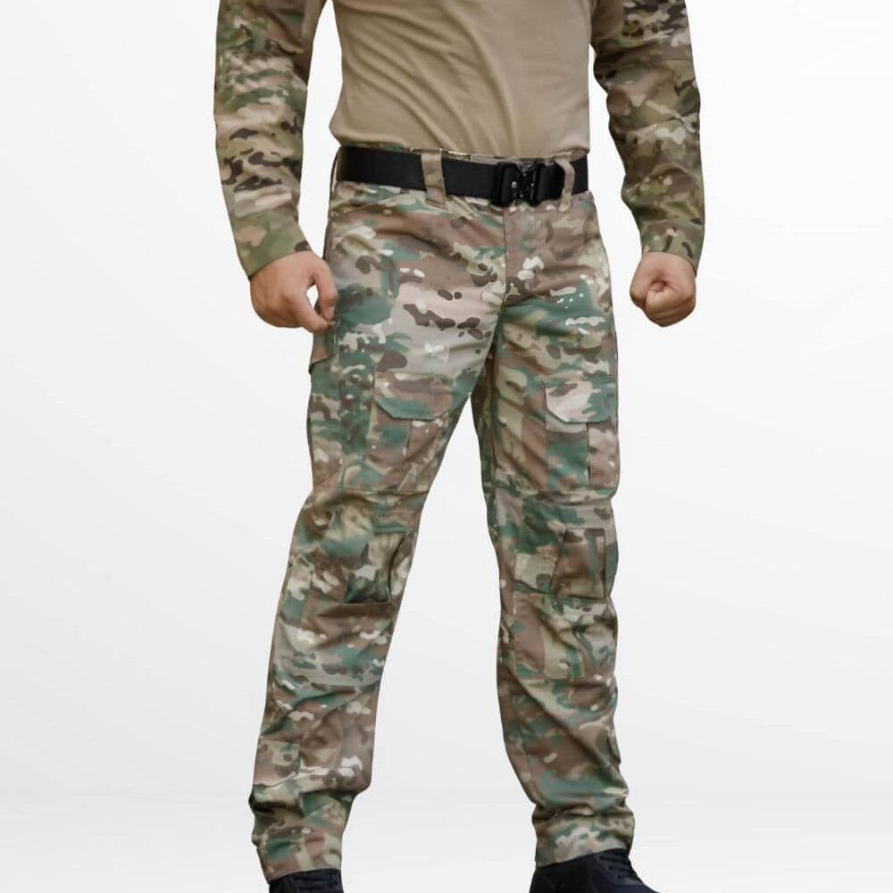 Men's army camo cargo pants with a front view, featuring multiple pockets and paired with a matching shirt and black combat boots.