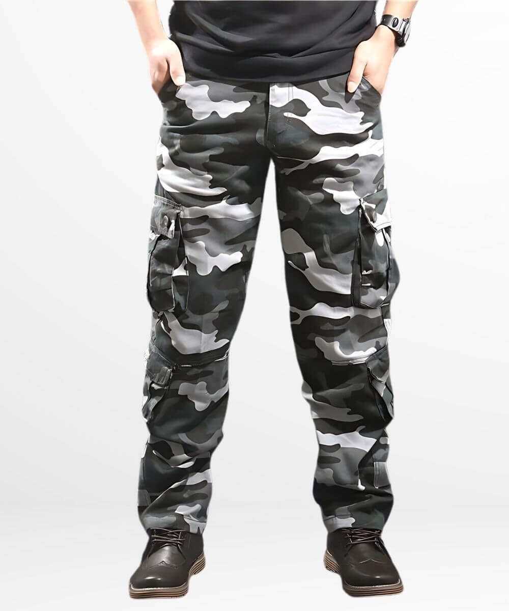 Front view of men's blue camouflage cargo pants with detailed pockets and rugged boots.
