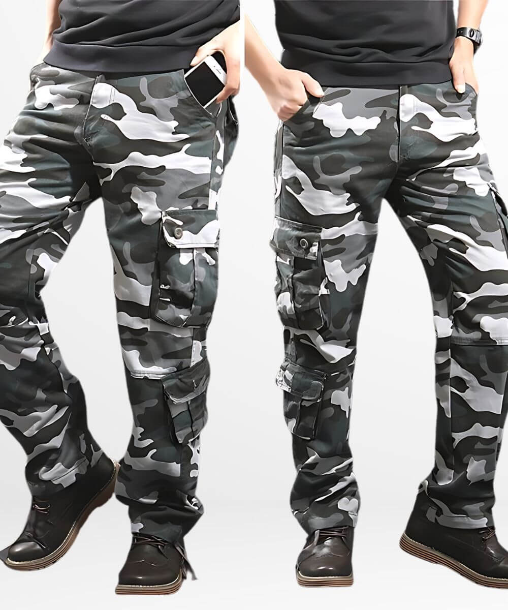 Side view of a man wearing blue camouflage cargo pants, focusing on the side pockets and fit.