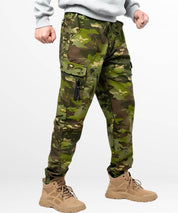 Side view of casual fit men's camouflage hunting pants with zippered pockets.