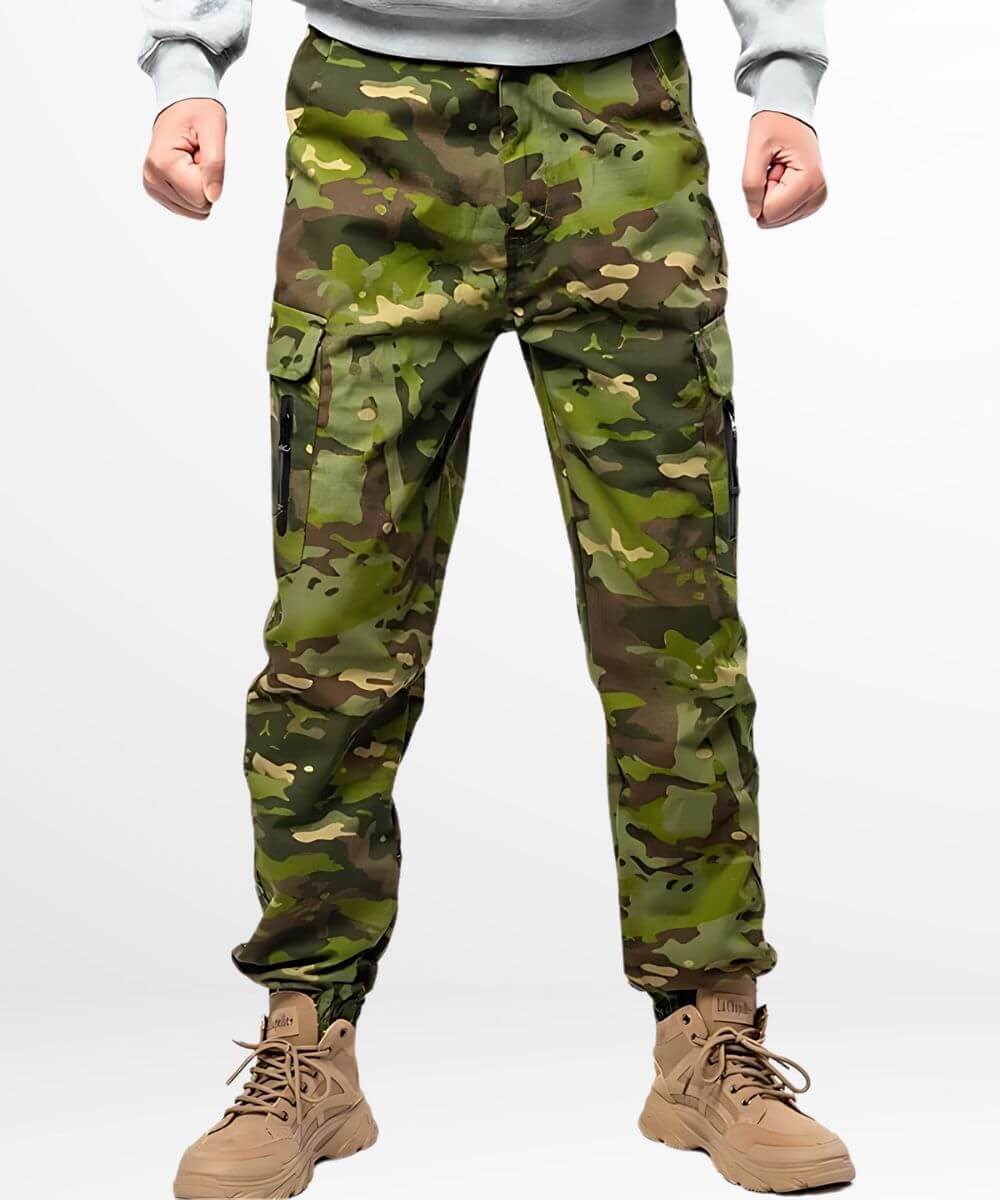 Front view of men's camouflage hunting pants paired with tan tactical boots.