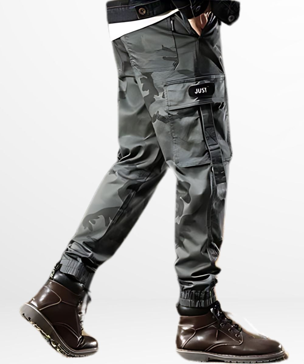 Walking pose in Men's Grey Camo Cargo Pants showcasing a comfortable fit and side cargo pockets.