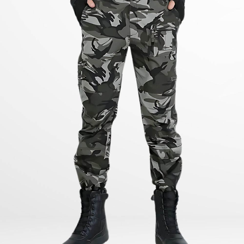 Front view of men's grey camo cargo pants with black boots and a tactical belt, ideal for outdoor activities.