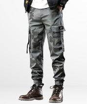 Side view of Men's Grey Camo Cargo Pants showing pocket details and a relaxed fit.