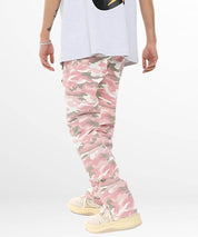 Back view of men's pink and white camo patterned cargo trousers with tapered fit and drawstring cuffs.