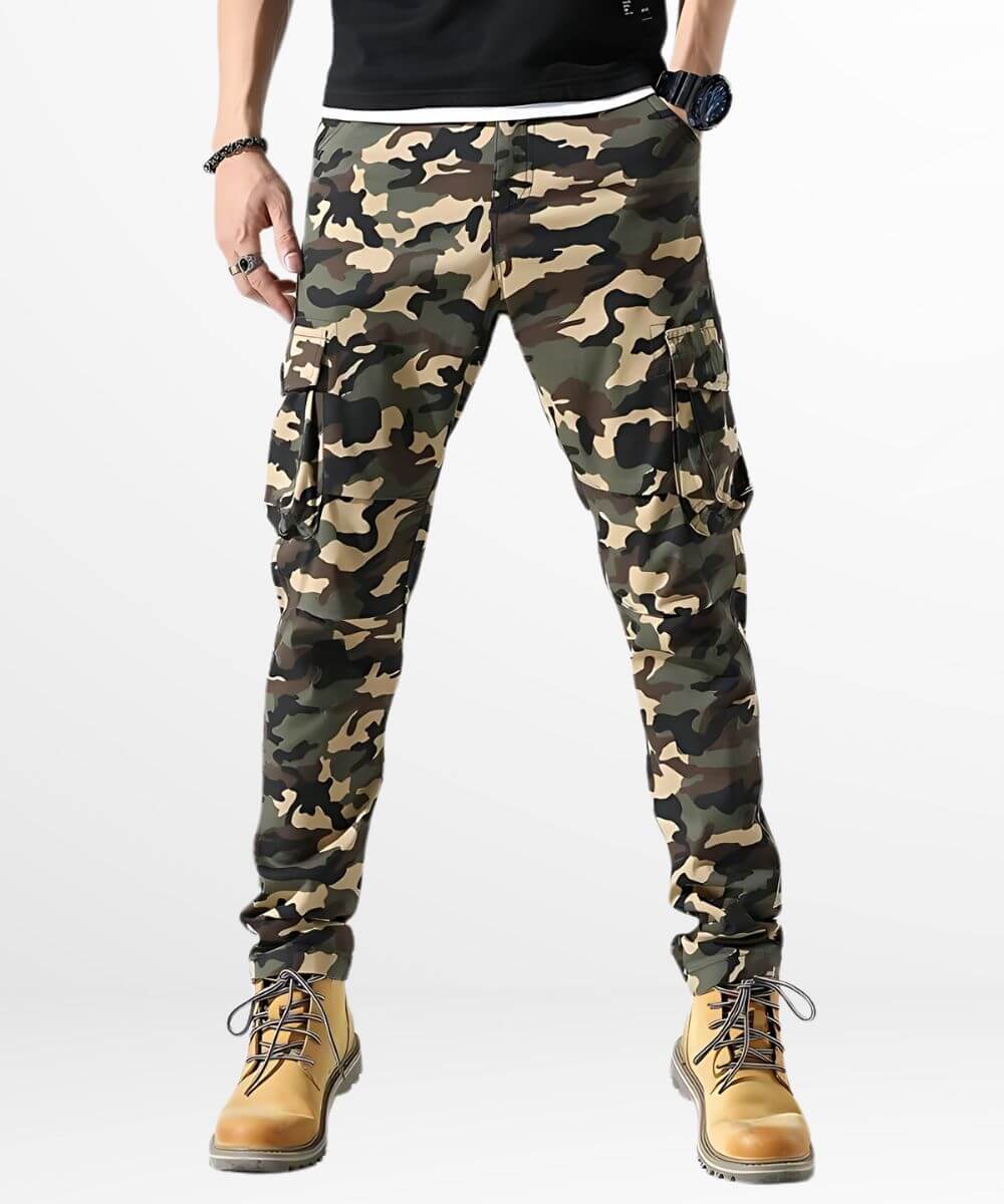 Front view of men's skinny camouflage cargo pants paired with yellow boots.