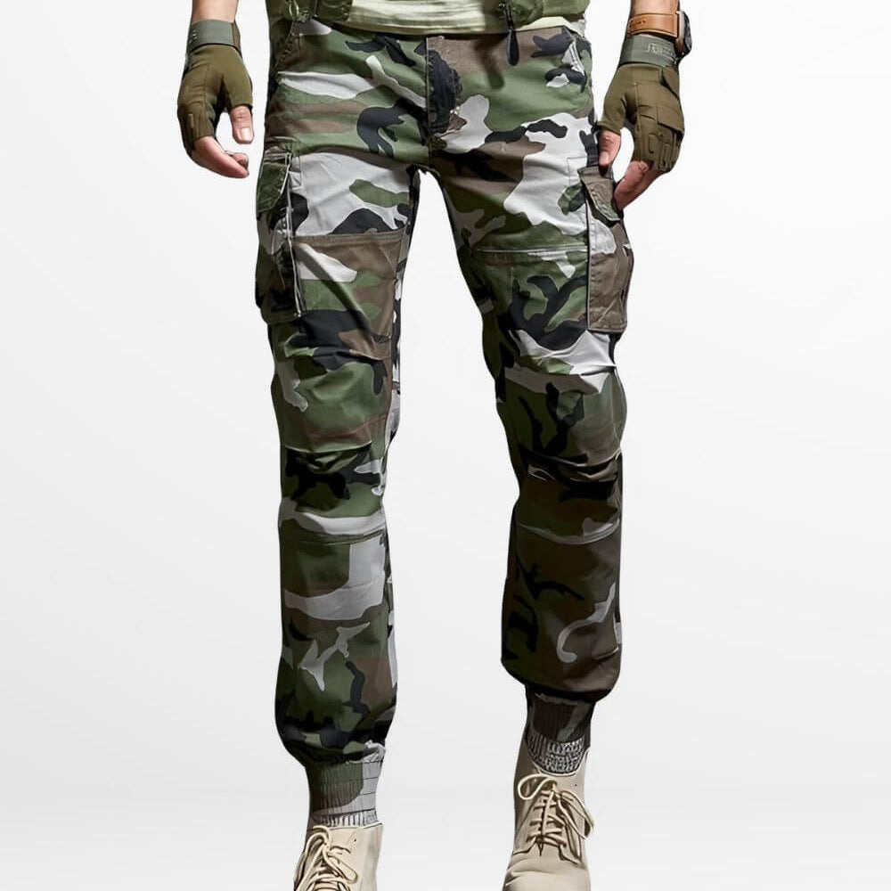 Street style front view of Men's Slim Camo Cargo Pants with tucked-in green shirt and tan boots.